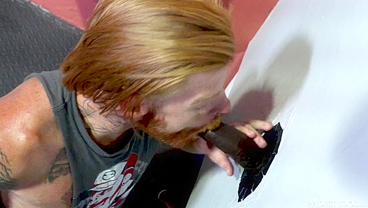 Tattooed Ginger Takes Massive BBC Dick Through Glory Hole – Hot Interracial Action
