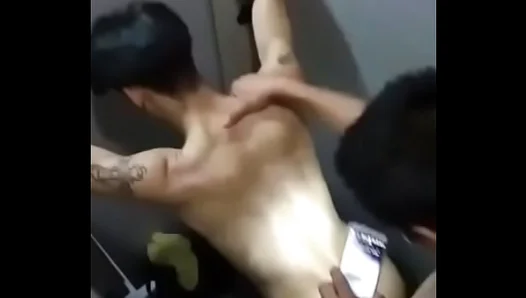 Steamy Asian Teens Explore Each Other in Public Restroom Stall – 18+GayFun