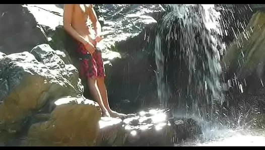 Hot Solo Under the Falls: Guy Jerks Off in Steamy Outdoor Escape – 18+