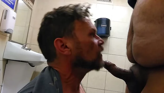 Chubby Coworker Surprises Guy With Blowjob Takes Load in Locker Room Stall –