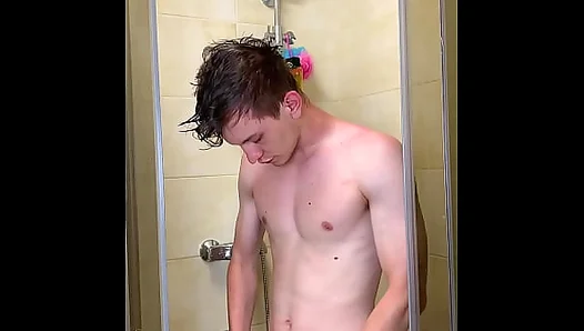 Slim Teen Rinses Off Under Hot Water, Revealing His Thick Uncircumcised Cock –
